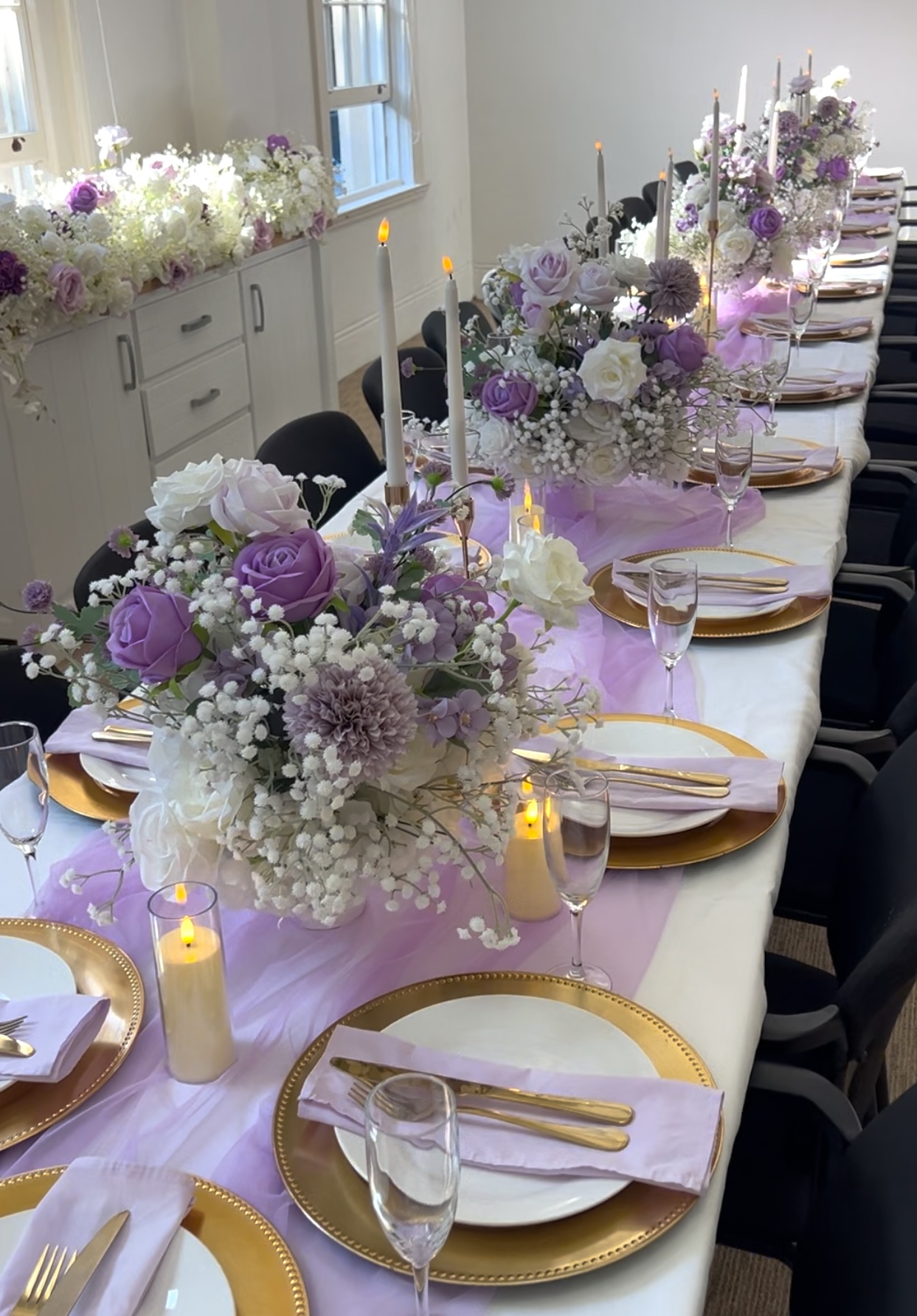 Table Centrepiece Wedding by luxury lane lilac flower and candles