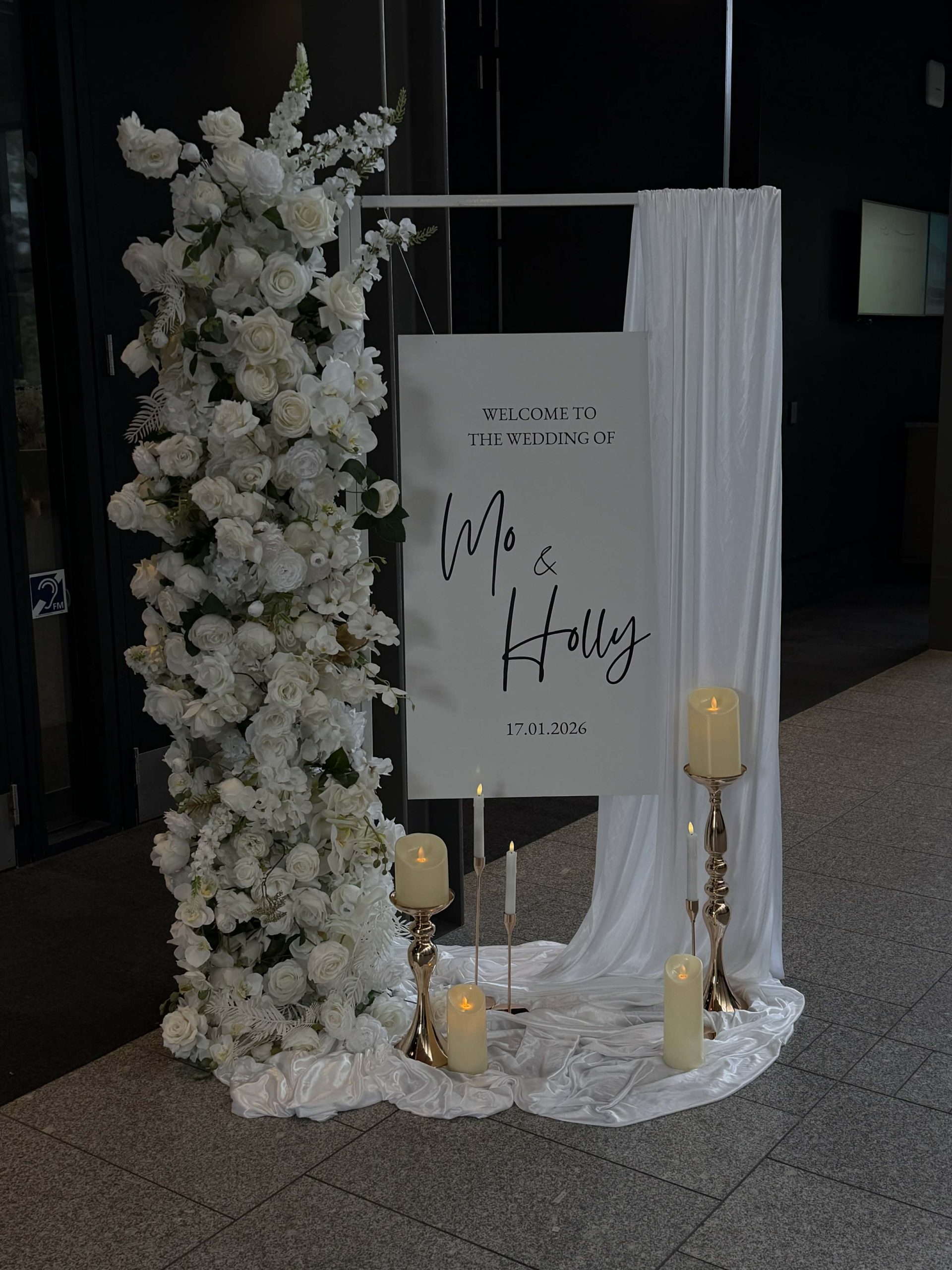 Welcome Sign with drape and flowers Luxury Lane