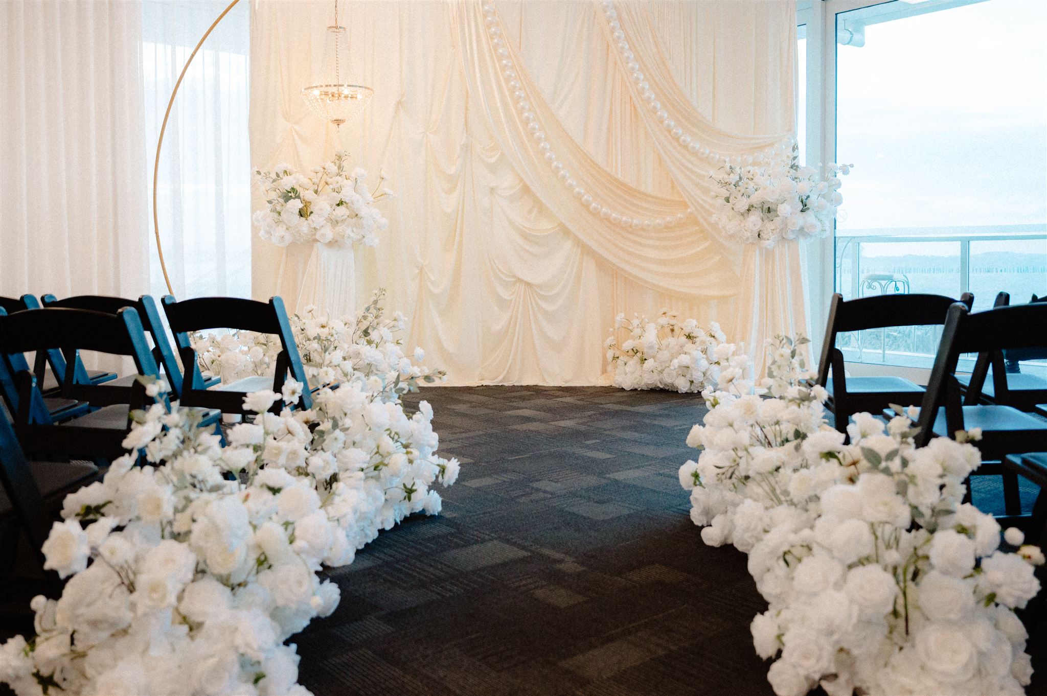 Akarana Wedding Open Ceremony by Luxury Lane Ivory drape backdrop