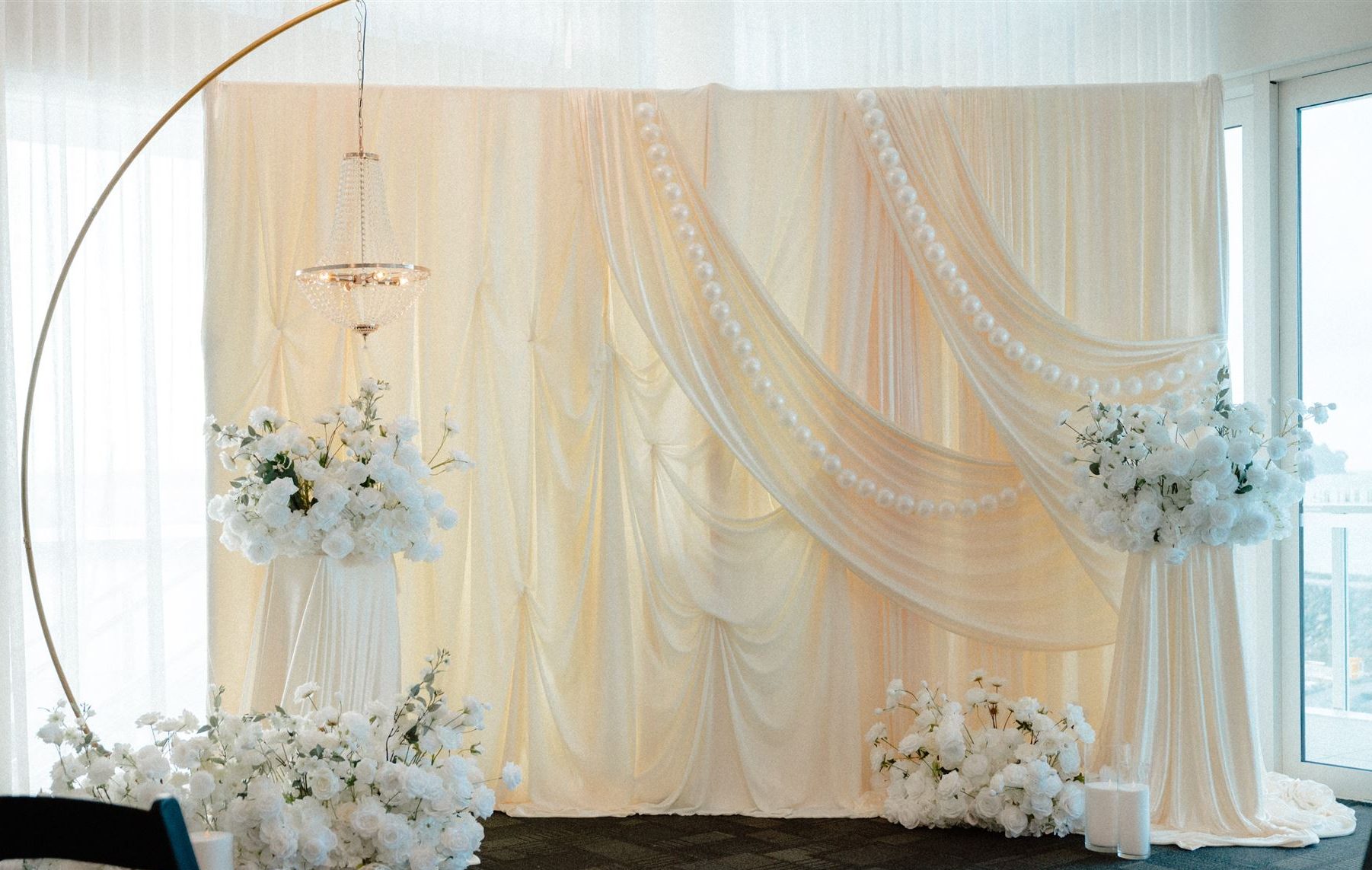 Akarana Wedding Open Ceremony by Luxury Lane Ivory drape backdrop