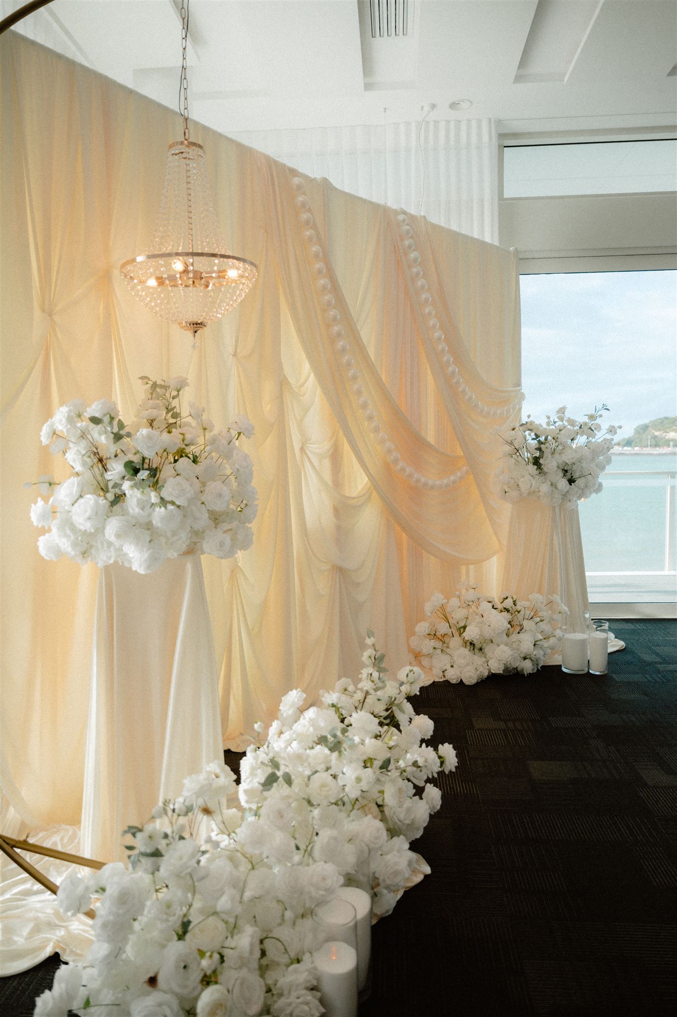 Akarana Wedding Open Ceremony by Luxury Lane Ivory drape backdrop